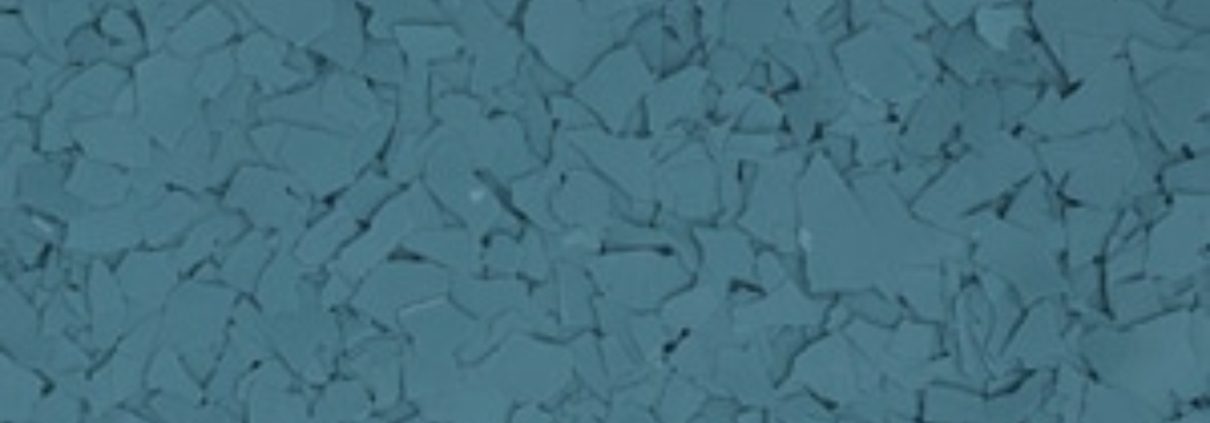 A close up of the blue color of a carpet.